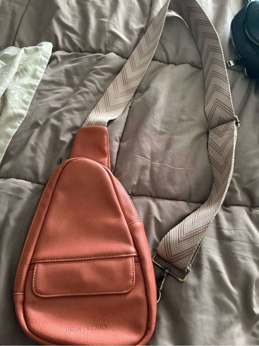 Urban Originals Coral-Orange Leather Sling Bag with Chevron Strap